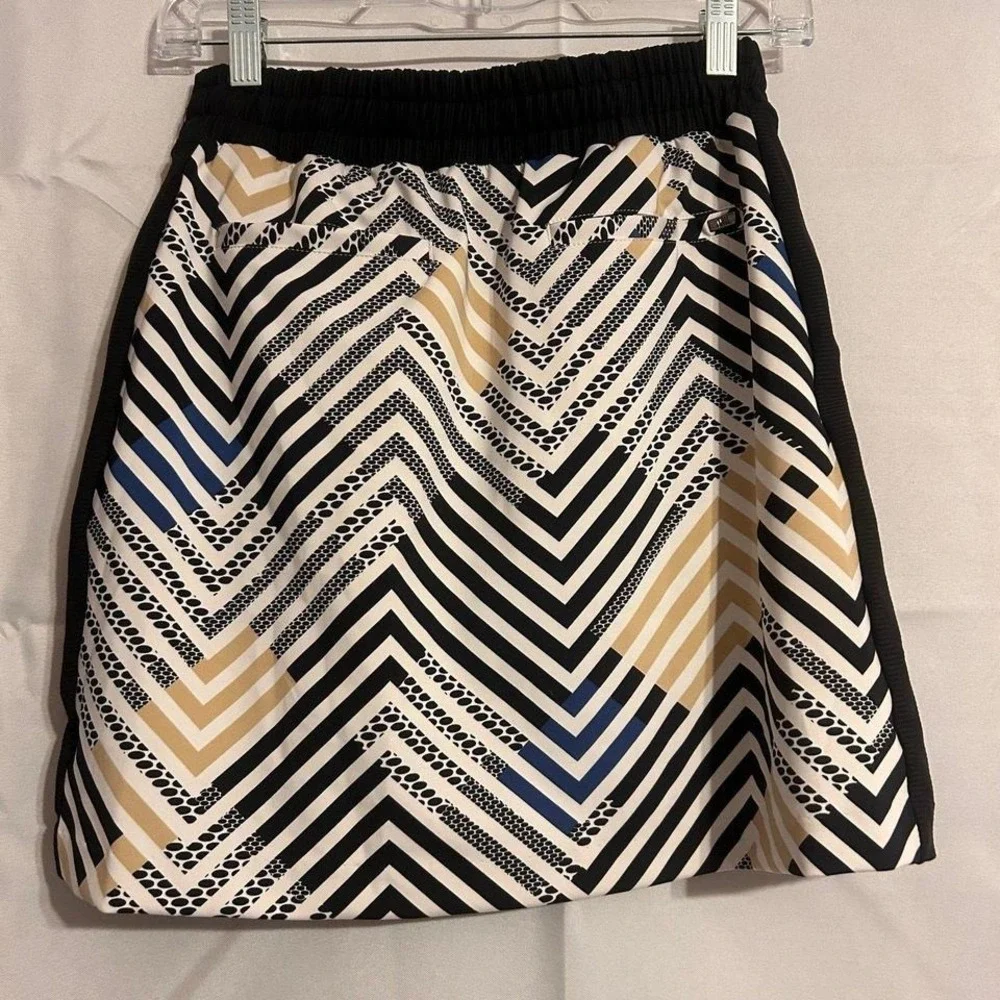 Tall brand tennis/pickleball skort like new XS‎ w pockets floral pleaded